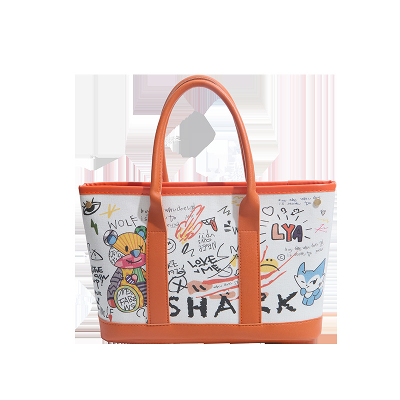 Invierno nuevo bolso de mujer personalidad graffiti portátil 2026 letras casuales Bear Tot bolso de cubo de hombro mochila