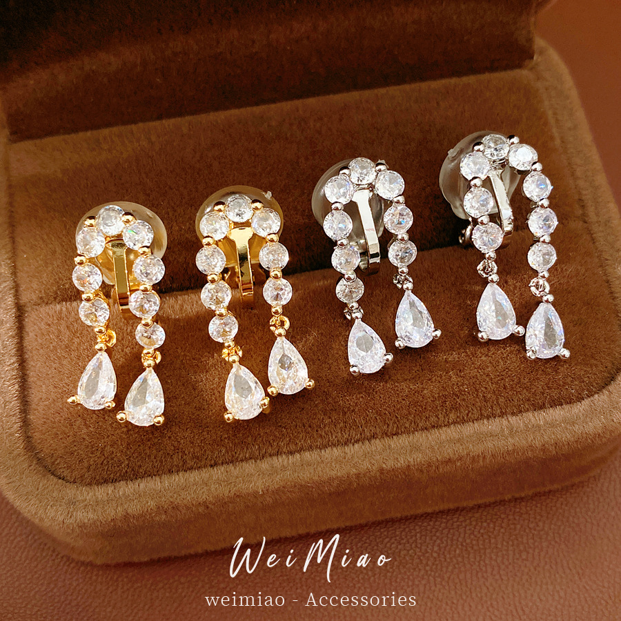 18 quilates de oro real galvanizado galvanizado galvanizado gota de agua orejas clips de orejas mujeres sin agujeros de orejas pendientes ligeros de lujo alta sensación de orejas al por mayor