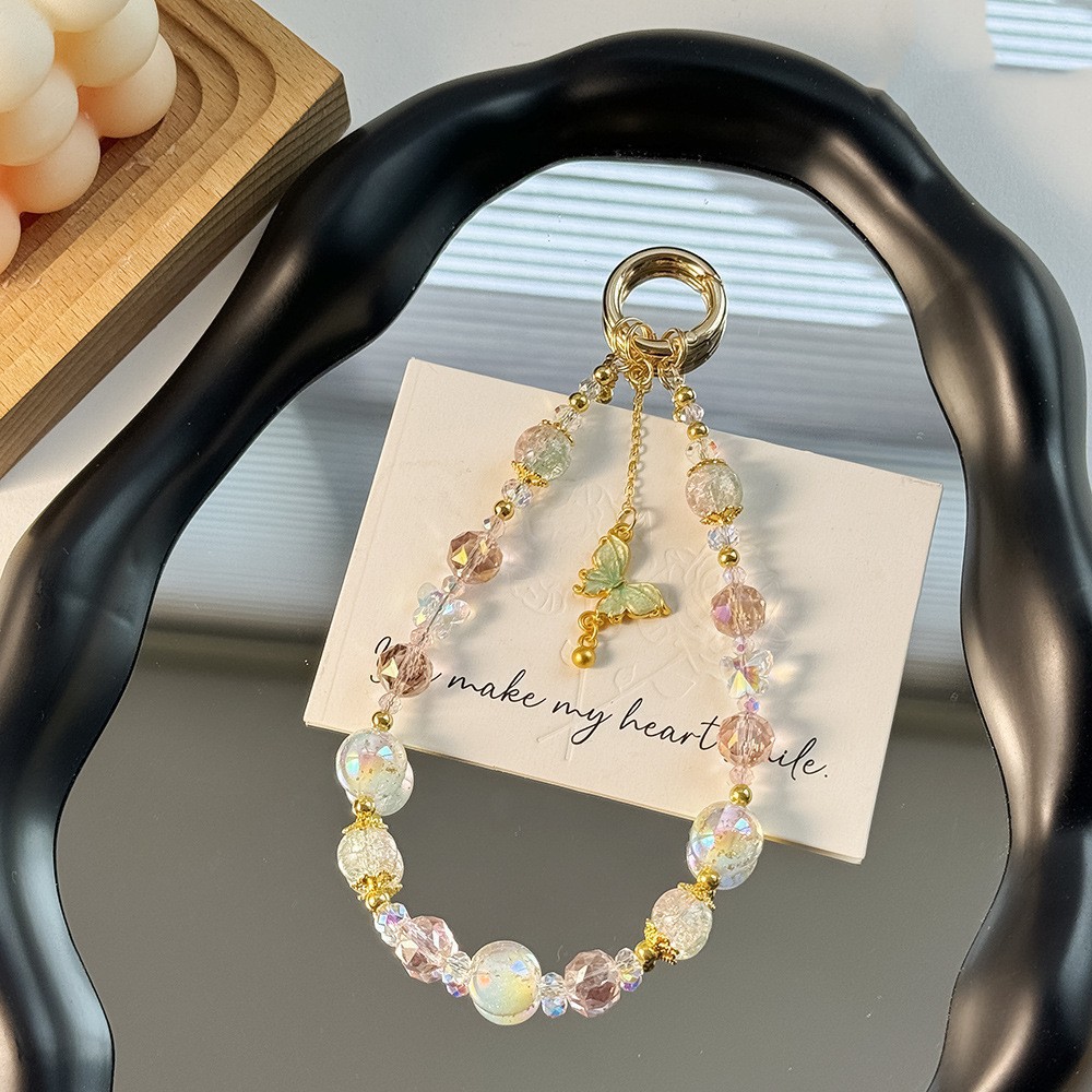 Nuevo estilo chino de alta calidad cadena de teléfonos móviles cristal ligero lujoso viento dorado colgante mariposa frillera corta cuerda de caso de teléfono móvil