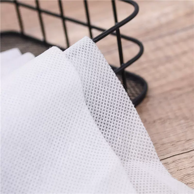 厂家批发纺粘无纺布布料防水透气服装辅料服饰纺织用布网纱面料