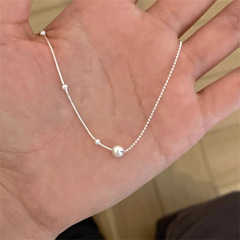 大衆のデザイン感の小さいボールの蛇の骨のチェーンのネックレスの女性はシンプルで冷たい風のファッションの気質に合わせて高級感の鎖骨のチェーンに入ります。