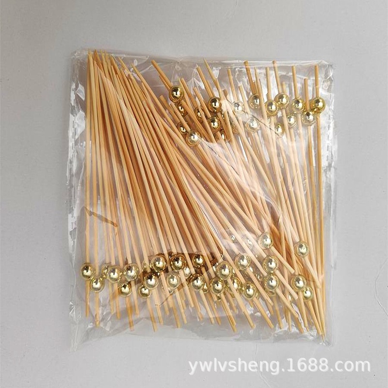 大サイズの金色のボールを提供します。銀色の丸い玉の果物は使い捨ての竹の署名のカクテルのビーズのチェーンの果物のフォーク100本です。|undefined