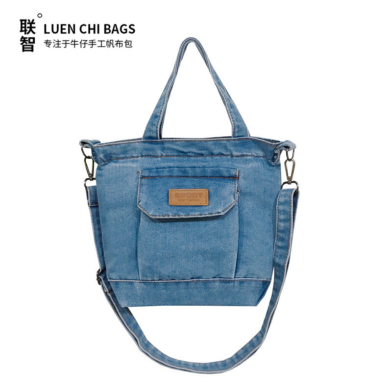Bolso vaquero nueva textura de moda simple versión coreana de la tendencia de bolso de hombro único ligero y de gran capacidad bolso de cercanías en clase