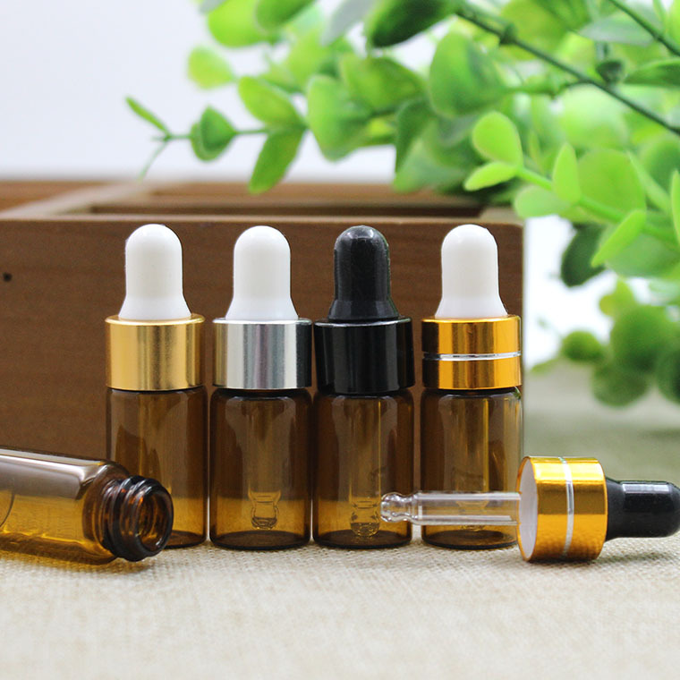 En stock lote de botella de aceite esencial marrón 3ml botella de vidrio pequeña muestra de prueba sub-botella de embalaje cosmético botella vacía