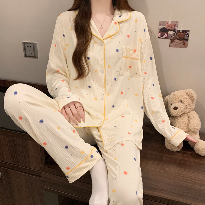 蝶結びのさくらんぼのプリントの女性のパジャマの春と秋の新型のカーディガンの長袖のズボンの部屋の服のスーツは実際に卸売りをたたきます。|undefined