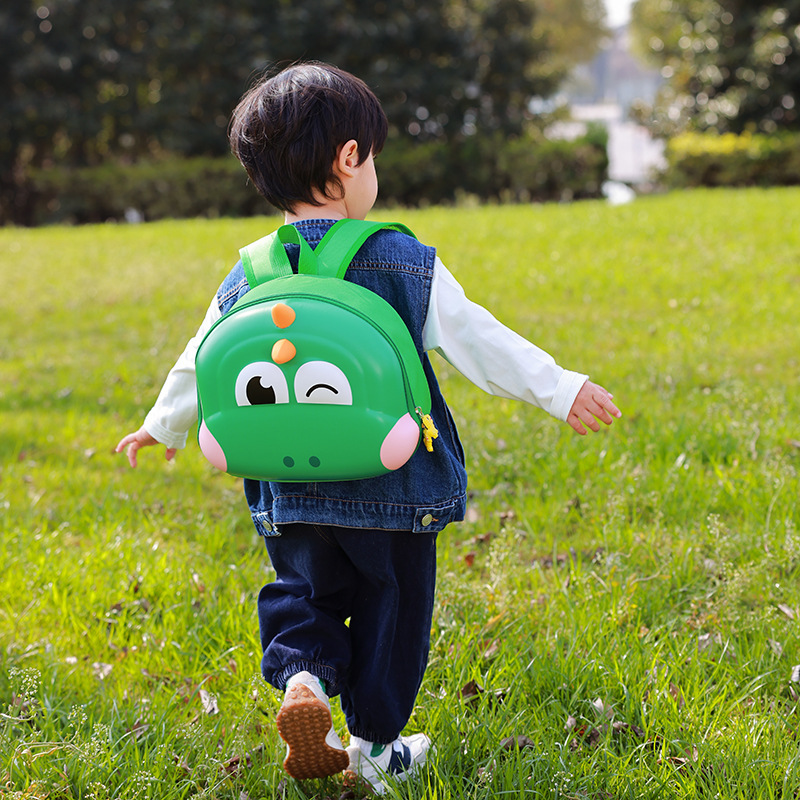 Nueva mochila de jardín de infantes Dinosauro 3D concha dura bolsas de hombres y mujeres con cáscara de huevo en el parque súper lindo bolsas anti-sucio para niños