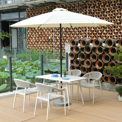 Mesa y silla al aire libre de tela de caña combinación de patio de hotel terraza jardín balcón café tela de caña mesa y silla de lujo al aire libre