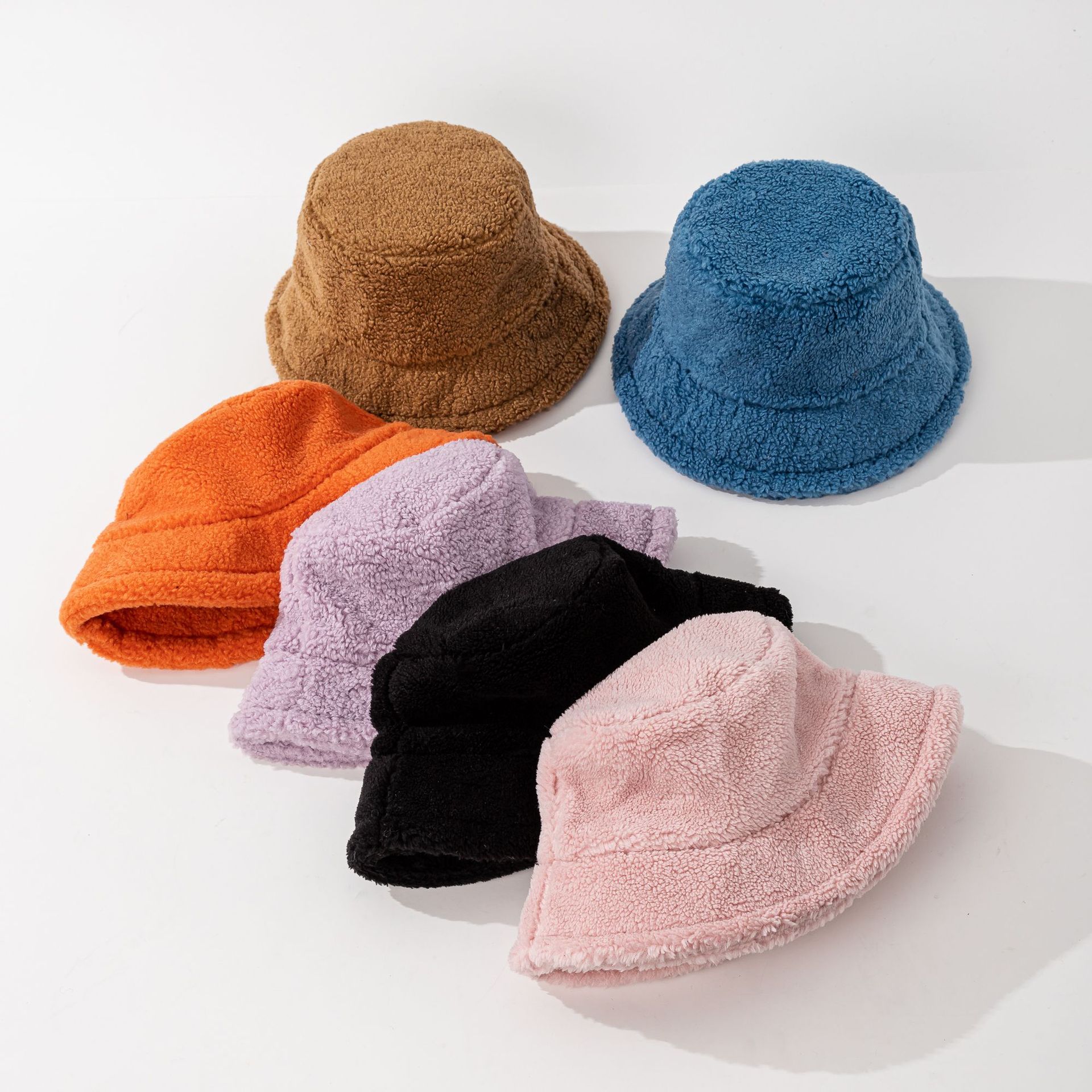 Sombrero de pescador de lana de cordero de color sólido para hombres y mujeres otoño e invierno nuevo cálido sombrero de cuenca engrosada gran circunferencia de la cabeza sombrero simple de todo fósforo