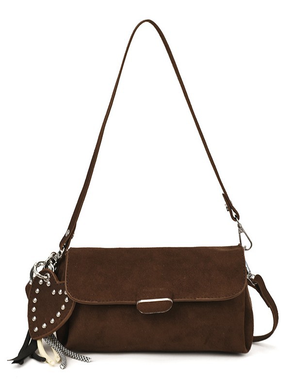 Nicho Zhong bolso de diseño para mujeres 2025, nuevo paquete de almohada cilíndrica de textura superior, simple paquete de hombro inclinado