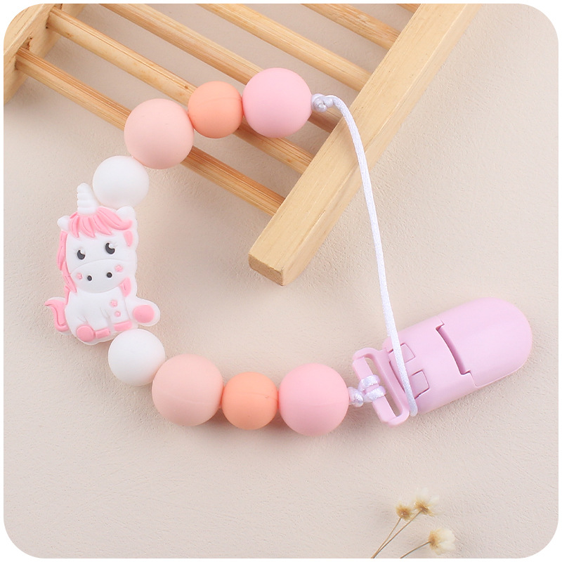 Nuevo bebé chupete cadena creativa bebé dibujos animados animal unicornio silicona mordedura molar anti-gota cadena