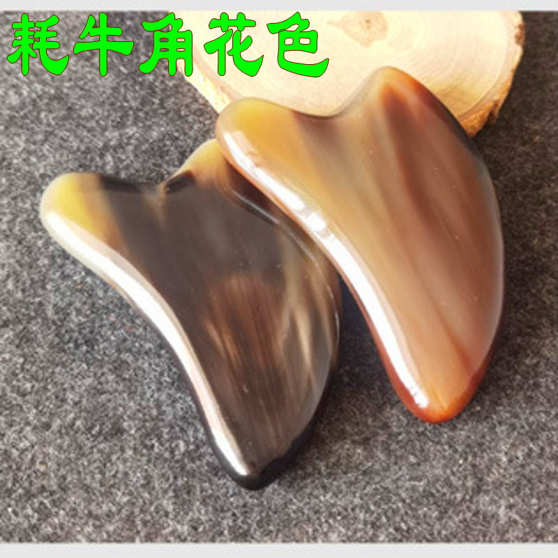 三角形のハート型の黄牛の角のスクレーパーの本場の牛の角のスクレーパーの切れの天然の牛の角のイルカの形のマッサージの切れ|undefined