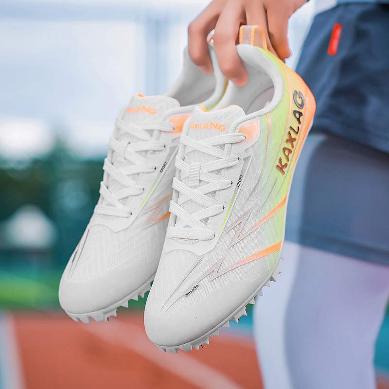 Zapatos de atletismo profesionales transfronterizos para estudiantes de prueba de escuela secundaria sprint de salto de longitud zapatos de carreras de entrenamiento transpirables ligeros zapatos deportivos mujeres