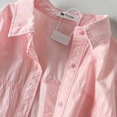 春の日のピンクの純綿は底のシャツを打って、女性の春の服の2025新型のシャツの小さい人のゆったりしている下着の上着を掛けます。