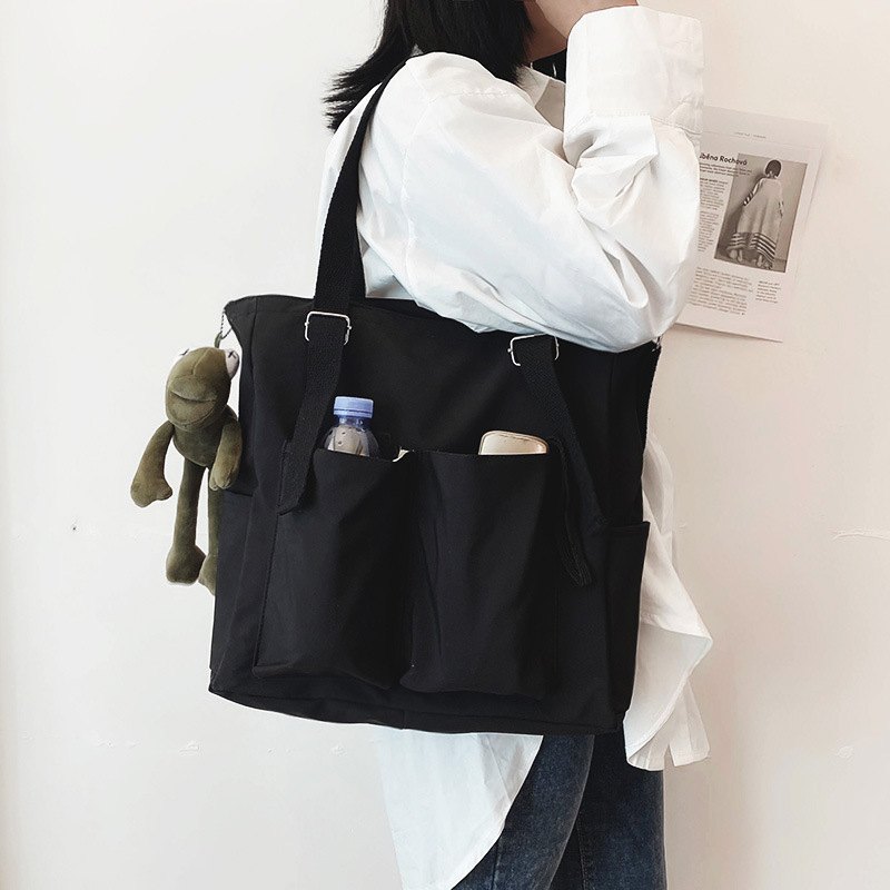 日系斜挎包女港风大容量通勤单肩包休闲简约工装大学生上课布包