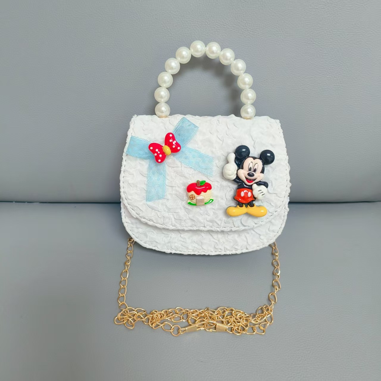 Bolso de perlas de arco de dibujos animados de Año Nuevo de chicas bolso de Año Nuevo de cadenas de viento fragante bolso cuadrado bolso de cambio de niños