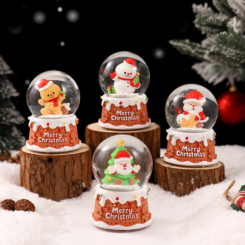Una variedad de regalos de decoración de Navidad Navidad iluminante bola de cristal caja de música ventana diseño de velas lámparas de viento árbol de Navidad
