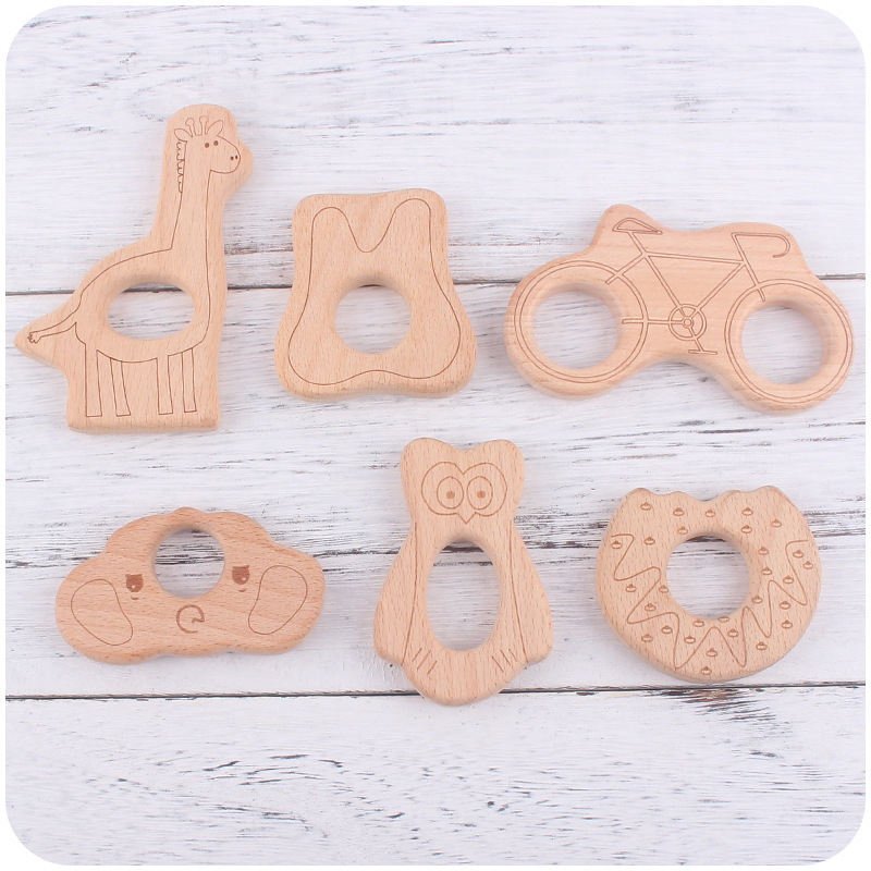 Nuevo bebé suministros de juguete de haya mordedor animal de dibujos animados gato aguacate girasol bebé molar teether