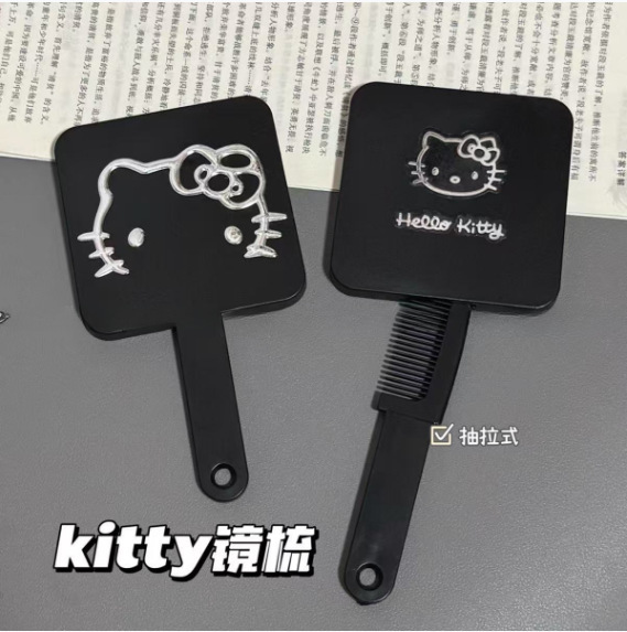 新しい種類のkitty猫のハンドルの鏡は櫛の引き出し式の携帯を持って化粧の鏡の少女の心の鏡を持って一体になります。|undefined