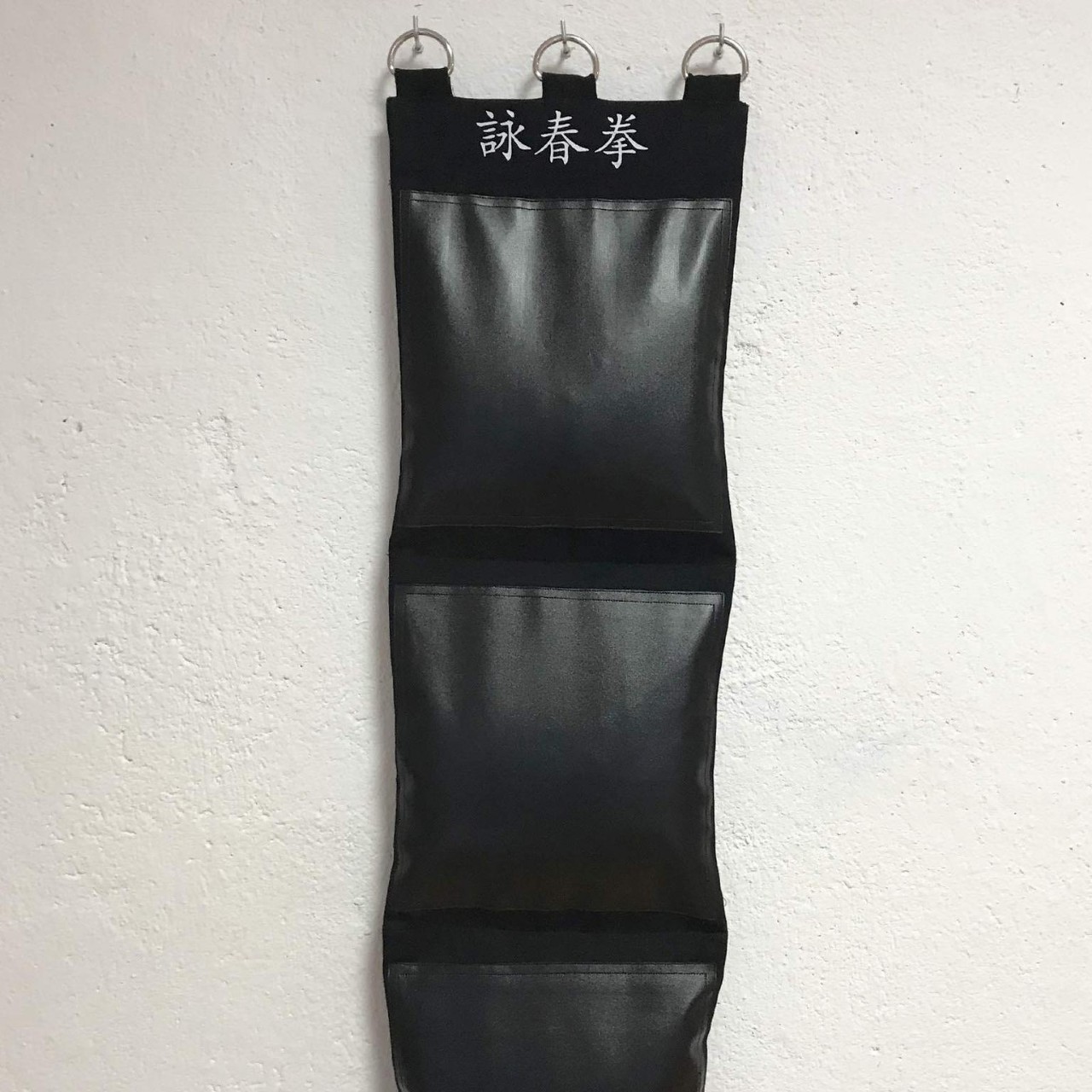 Cross-border wall-mounted punching bag, Yip Man boxing target, three-section, canvas and PU leather, unfilled