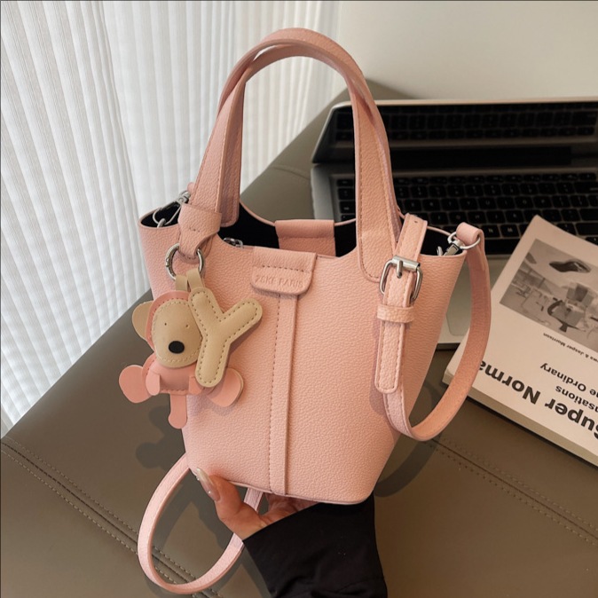 2025 nuevo bolso de nicho bolso de cubo con patrón de lichi bolso de canasta de verduras de alta calidad bolso de hombro bolso de mensajero de moda