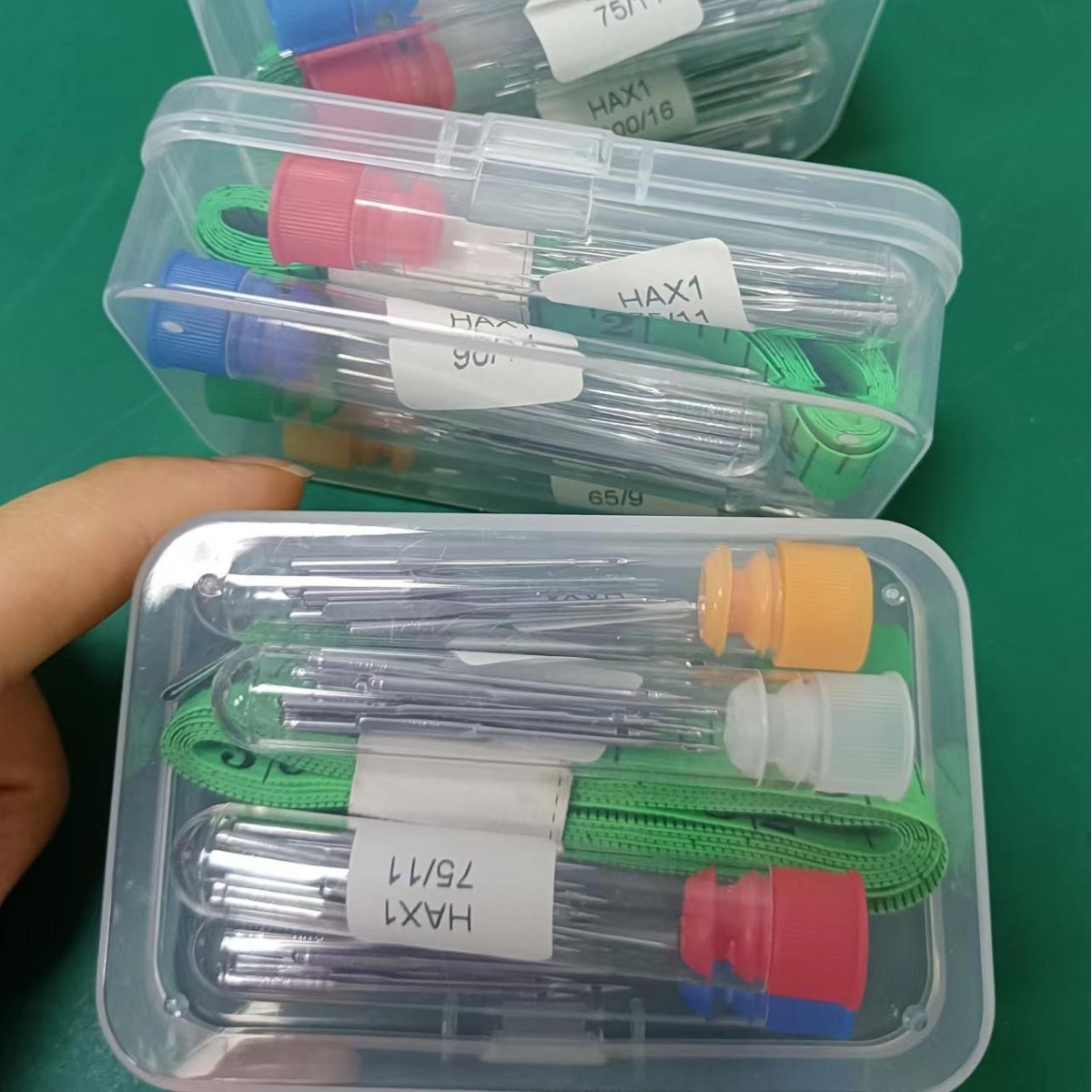 HA máquina de coser doméstica aguja de alta calidad cromado Flying Tiger máquina aguja accesorios de costura traje con jeringa botella de almacenamiento aguja doméstica