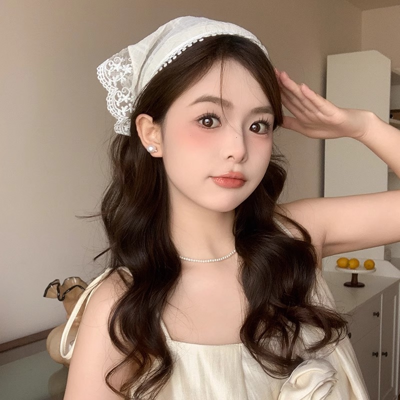 Diadema de encaje beige