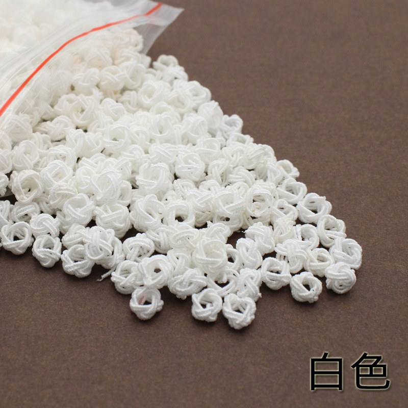 Venta al por mayor piña hebilla DIY material hecho a mano piña nudo chino nudo accesorios 6mm nylon piña nudo bolsa hebilla