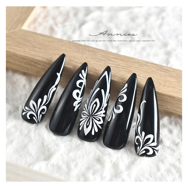 Ennishi estilo japonés sin lavado tridimensional pegamento de alivio manicura línea pintada en blanco y negro yeso fototerapia pegamento fábrica al por mayor