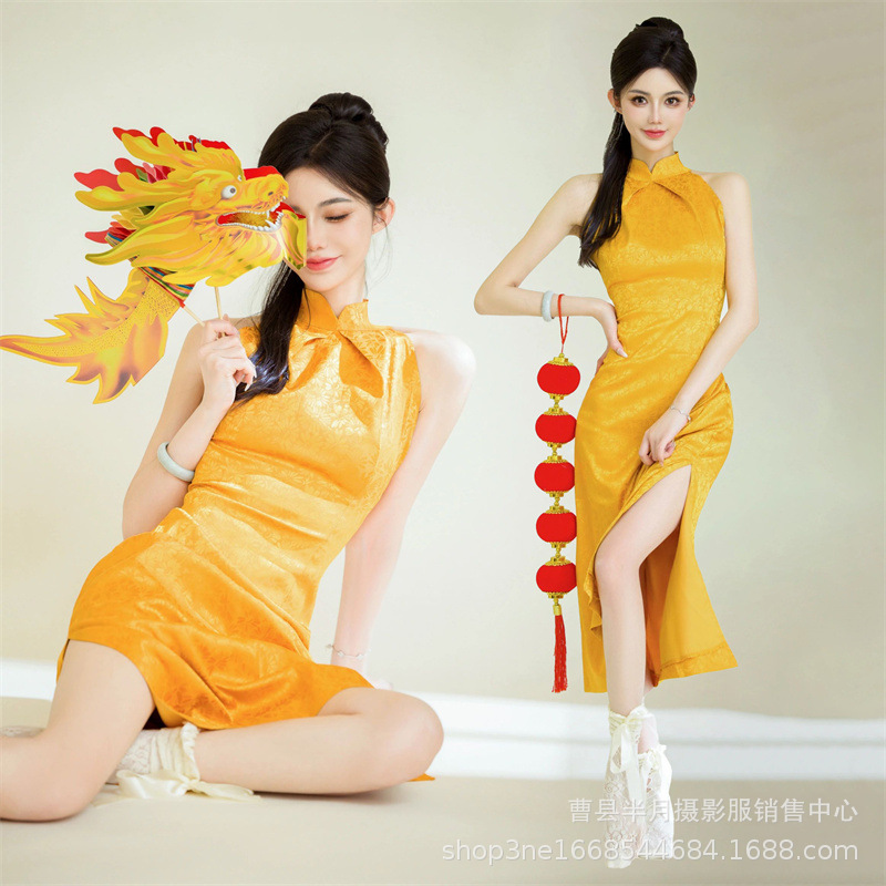 影楼新年主题新款连衣裙个人写真复古中国黄色旗袍龙年摄影服饰