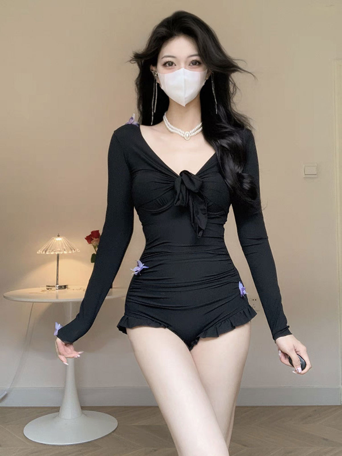Traje de baño para mujer 2025 nuevo estilo sexy negro de una pieza que cubre la carne y se ve delgada, blusa de manga larga con soporte de acero recogido, conjunto de dos piezas de aguas termales