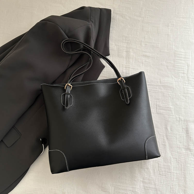 Alta sensación de gran capacidad bolso de mano 2024 otoño y invierno nuevo estilo versátil bolso de hombro de viaje al trabajo bolso especial