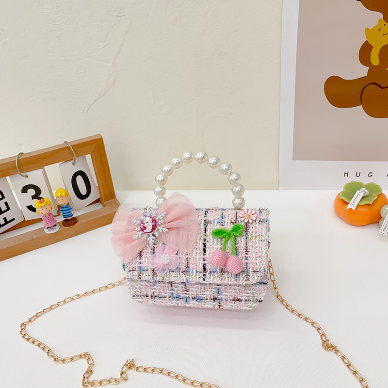 Nuevo bolso de mensajero de La Niña de los niños niña estilo de Chanel estilo occidental Linda niña linda de dibujos animados portátil pequeña bolsa