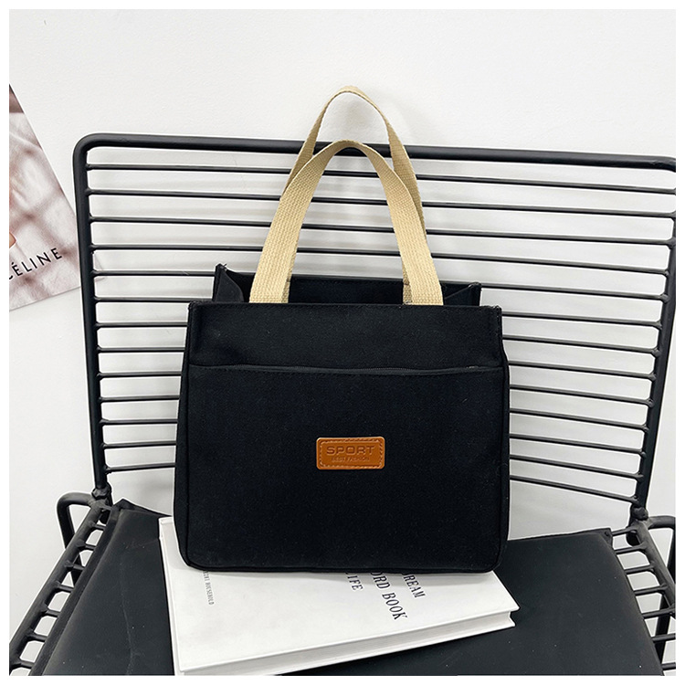 New wholesale fashionable and high-quality canvas handbag, simple and portable, easy to carry for going out, versatile lunch box and bento bag undefined