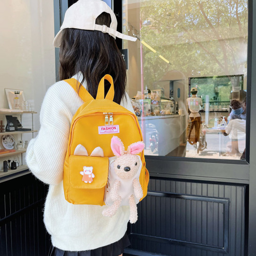 Winter new Japanese style contrasting color backpack, kindergarten primary school student bag, Korean version Harajuku cartoon cute backpack