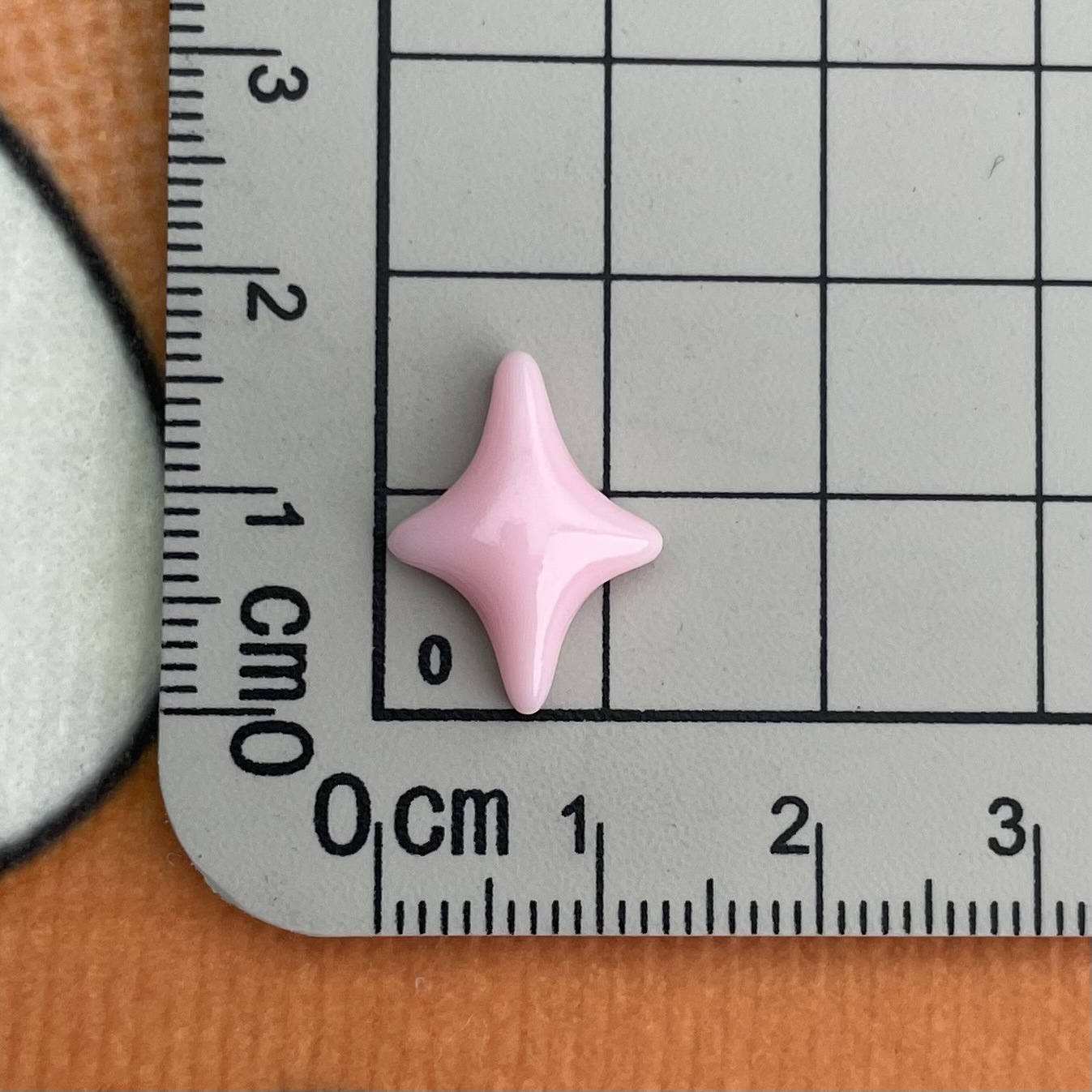 06 * Estrella rosa de cuatro esquinas pequeña