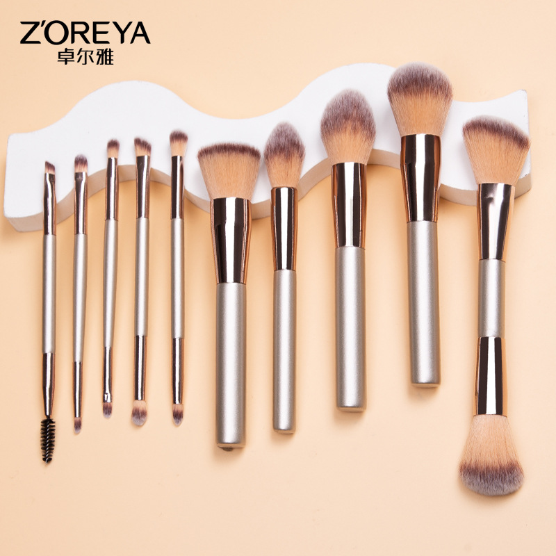 Zhuolya nuevo champán traje de belleza sombra de ojos polvo suelto cepillo de labios herramientas de maquillaje 10 pinceles de maquillaje conjunto completo Al Por Mayor