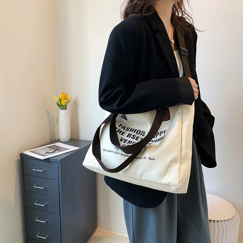 Simple canvas large-capacity casual bag for women 2024 new style lazy style one-shoulder fashion printed letter tote bag