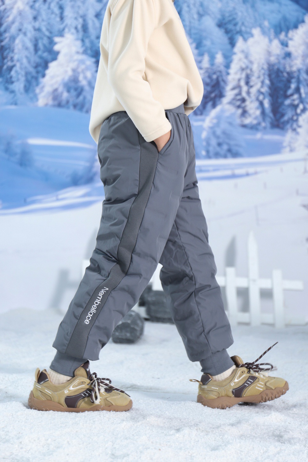 Pantalones de plumas para niños invierno nuevo 90 pantalones blancos de invierno tres pantalones de esquí de esquí de niños y niñas