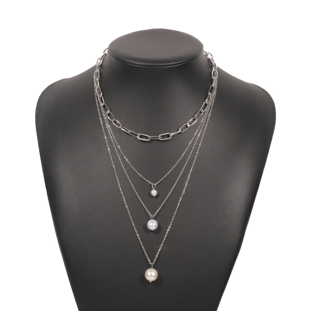 Retro Multi-layered Wearing Temperament Necklace Imitation Pearl Chain Niche Exaggerated Necklace display picture 2