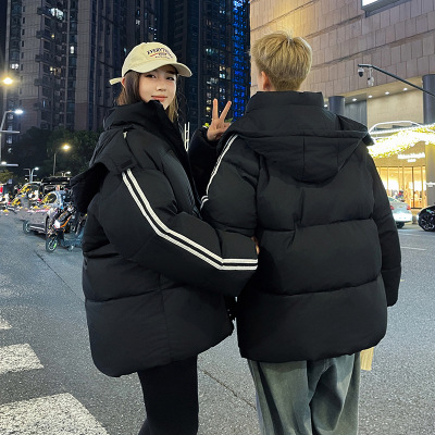 Comercio exterior ropa de algodón de pluma negra mujer invierno 2025 nuevo estilo coreano suelto estudiantes de algodón grueso chaqueta de algodón abrigo de moda