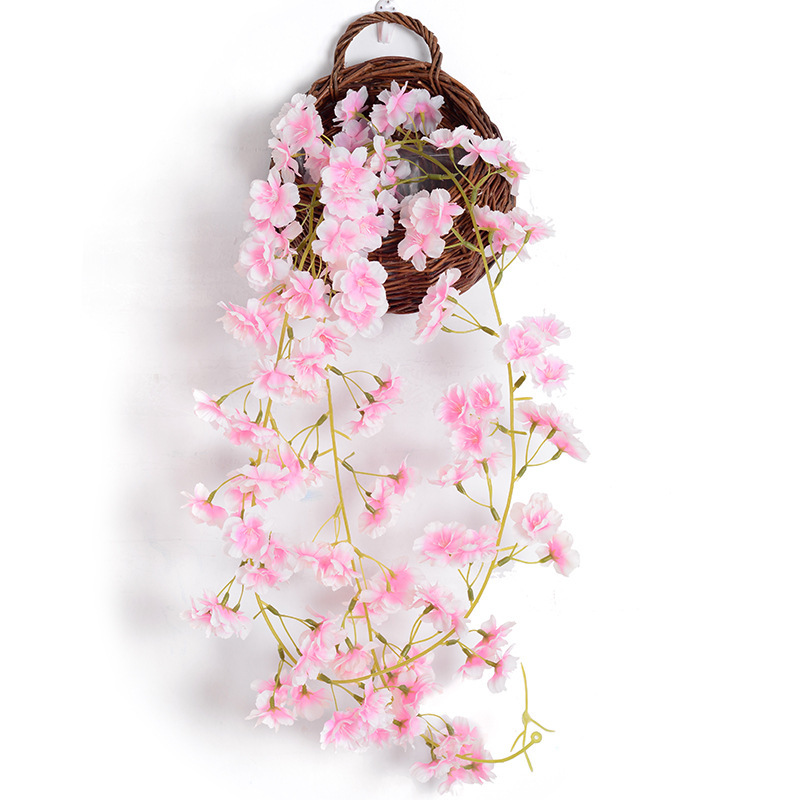 135 flor de cerezo Vine rosa claro