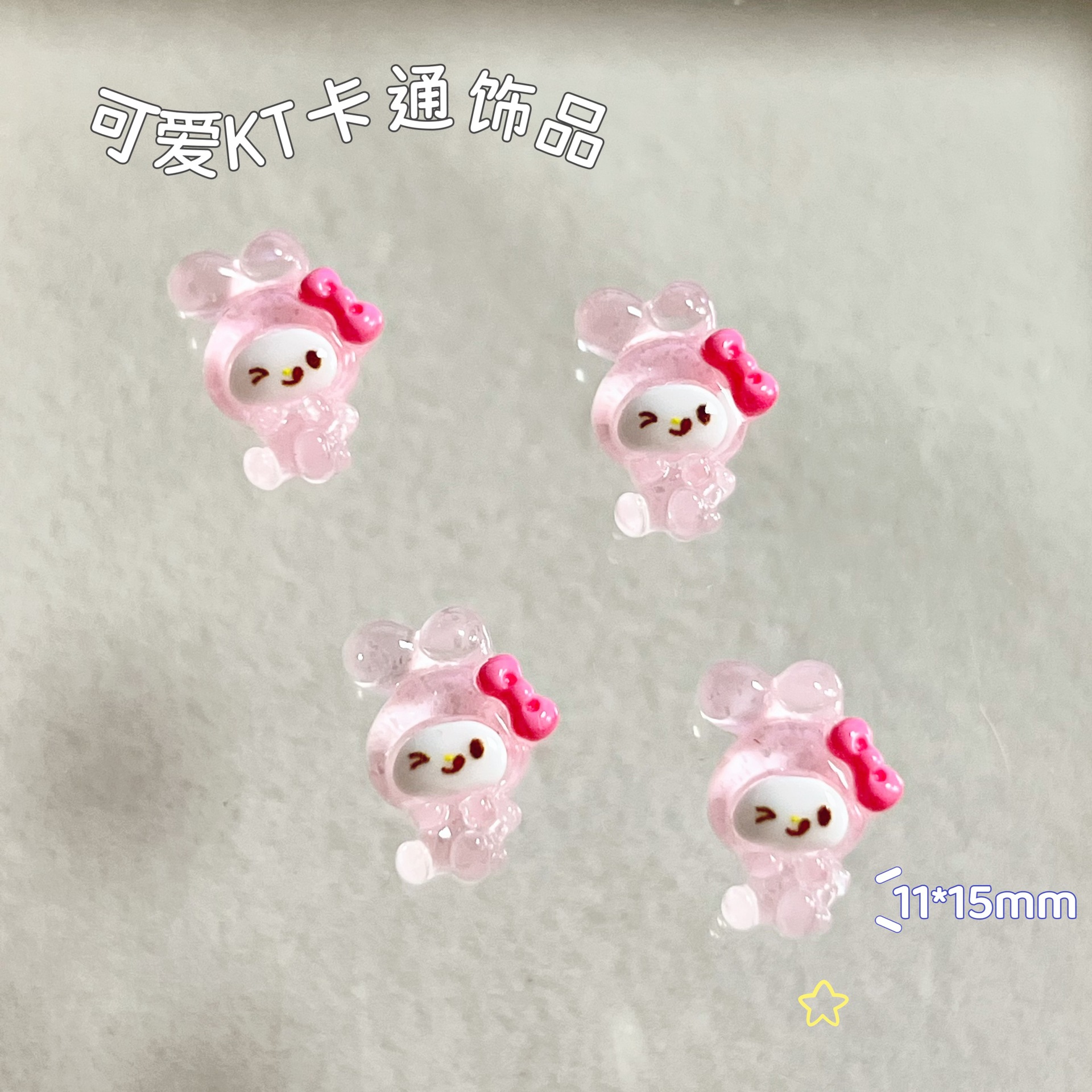 新商品のキティキャットの三麗鴎のネイルアクセサリーのネットの赤い爆発の樹脂のかわいいkt猫は甲を着て飾ります。