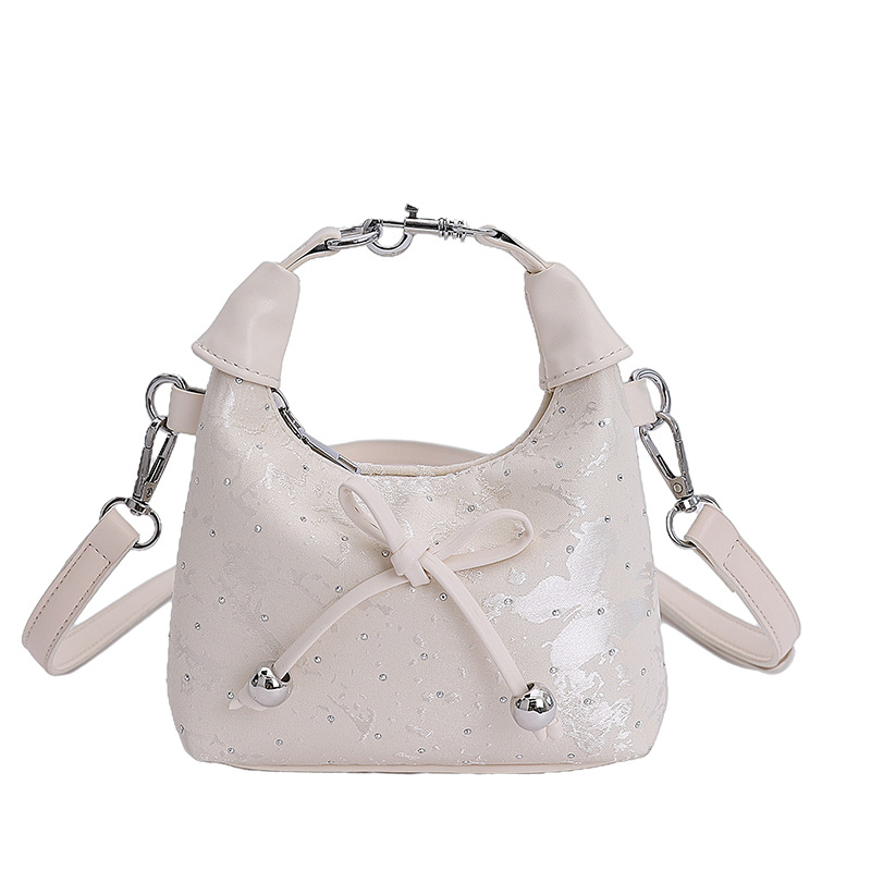 Bolsos populares de este año 2025 verano nuevo bolso femenino lindo lazo bolso de hombro mini bolso de mensajero de diamantes