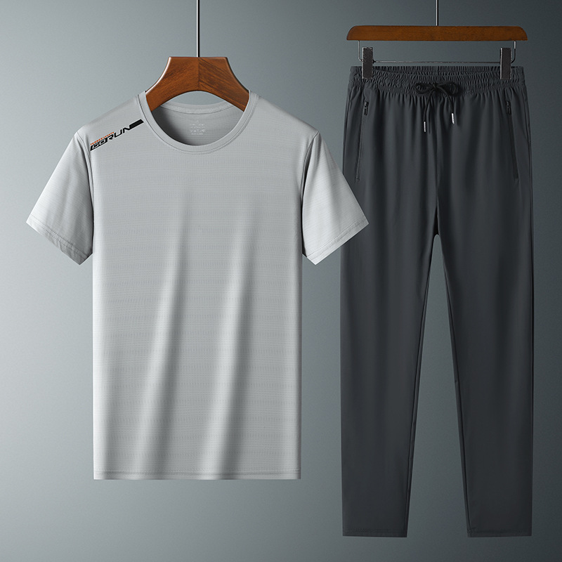 Moda pantalones de seda de hielo cuello redondo Camiseta de dos piezas para hombres talla grande suelta de secado rápido traje deportivo LOGO se puede formular