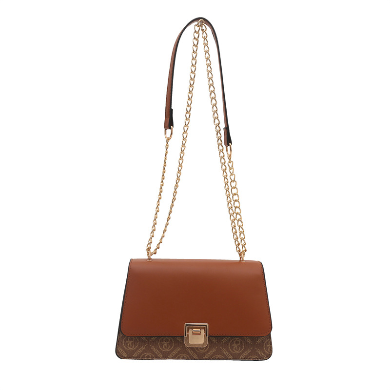 2024 otoño y invierno nueva moda bolsas de cadena de color sólido textura casual bolsas inferiores retro bolsas de bloqueo de aire extranjero