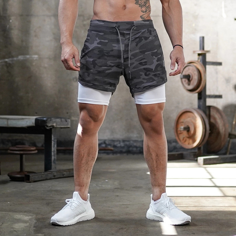 Pantalones cortos para hombre 2025 verano nuevo estilo americano de doble capa carrera de secado rápido deportes fitness ocio al aire libre pantalones sueltos de cinco puntos