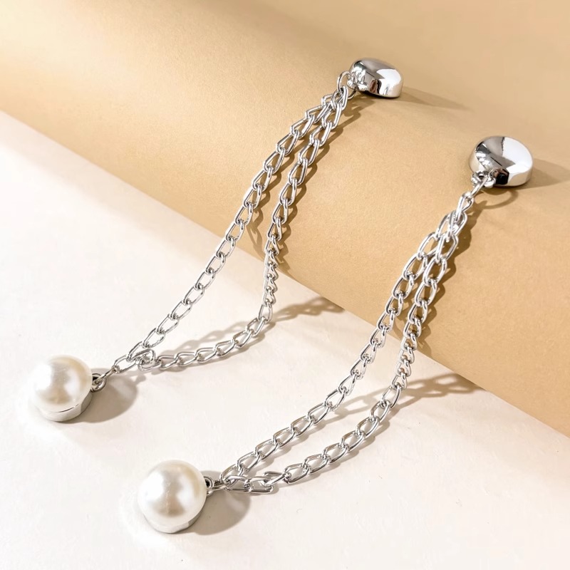 Esquina de la camiseta, peldaño apretado, artefacto corto, botones de nudos, mangas fijas, pantalones fijos, pies, cadena anti-flip, botones de succión magnéticos