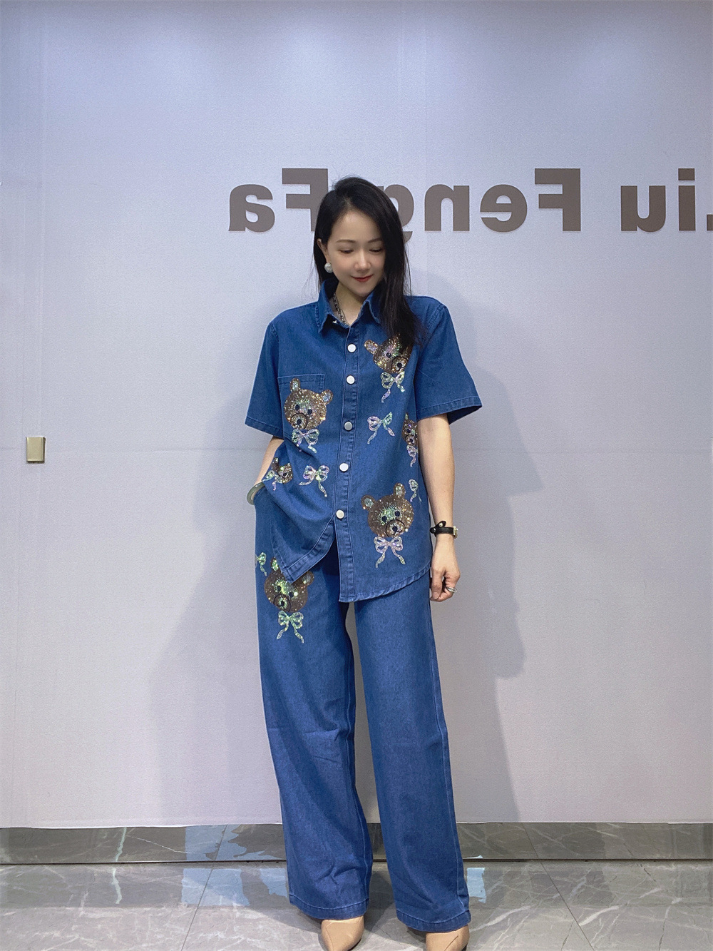 Comercio exterior transfronterizo de Europa y Estados Unidos ropa de mujer jeans de tamaño grande taladro caliente camisa de mangas cortas cintura elástica pantalones largos de piernas largas dos piezas set