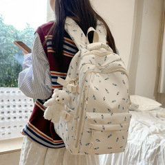 外国貿易の簡単な大容量のプリントのランドセルの女子学生の軽いカジュアルなリュックサックの中学生のかばんの百合