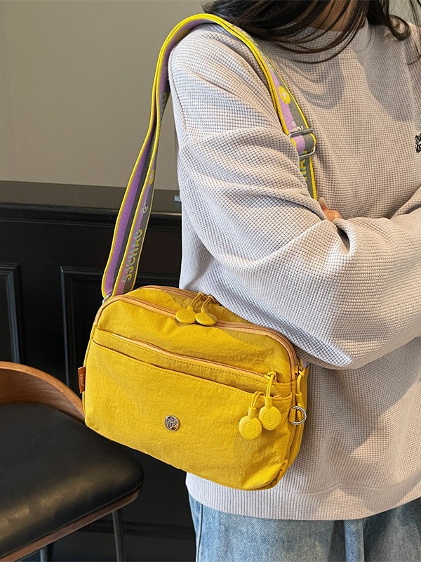 Oxford tela ligera bolsa casuales para mujeres 2025 nuevo estilo simple de moda textura de viaje mochila de hombro